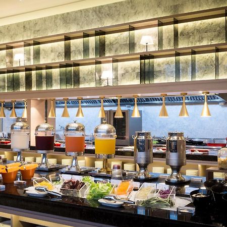 คังเยว่ ฮอต สปริง รีสอร์ต Hotel หลัวตง ภายนอก รูปภาพ The buffet at the hotel