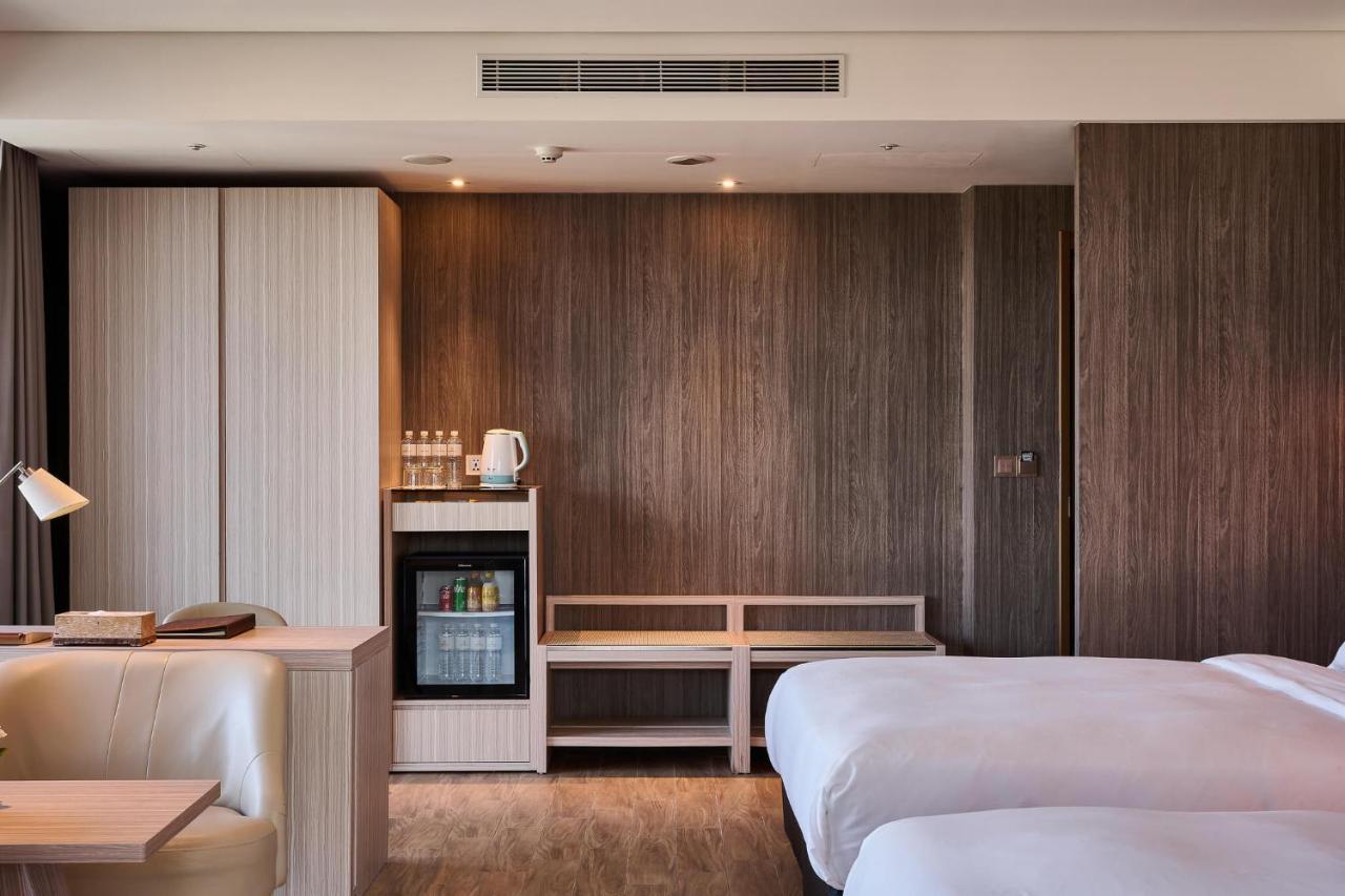 คังเยว่ ฮอต สปริง รีสอร์ต Hotel หลัวตง ภายนอก รูปภาพ A room at the hotel