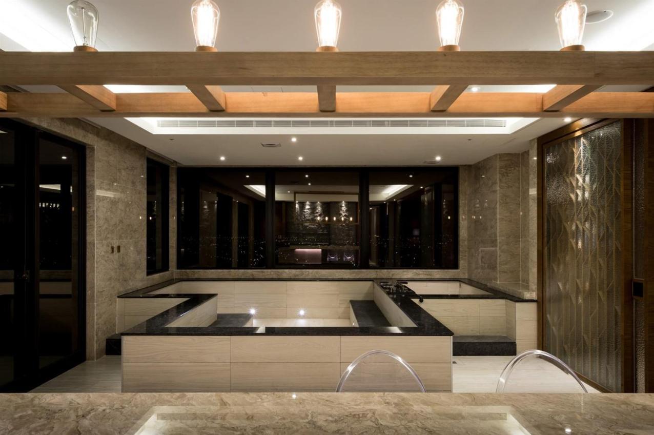 คังเยว่ ฮอต สปริง รีสอร์ต Hotel หลัวตง ห้อง รูปภาพ The interior of the hotel
