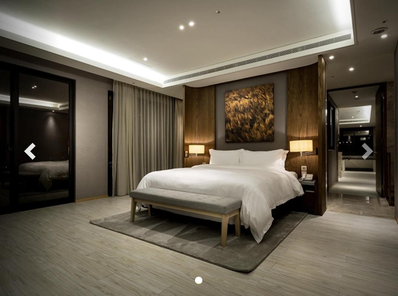คังเยว่ ฮอต สปริง รีสอร์ต Hotel หลัวตง ห้อง รูปภาพ A bedroom at the Ritz-Carlton, Maldives