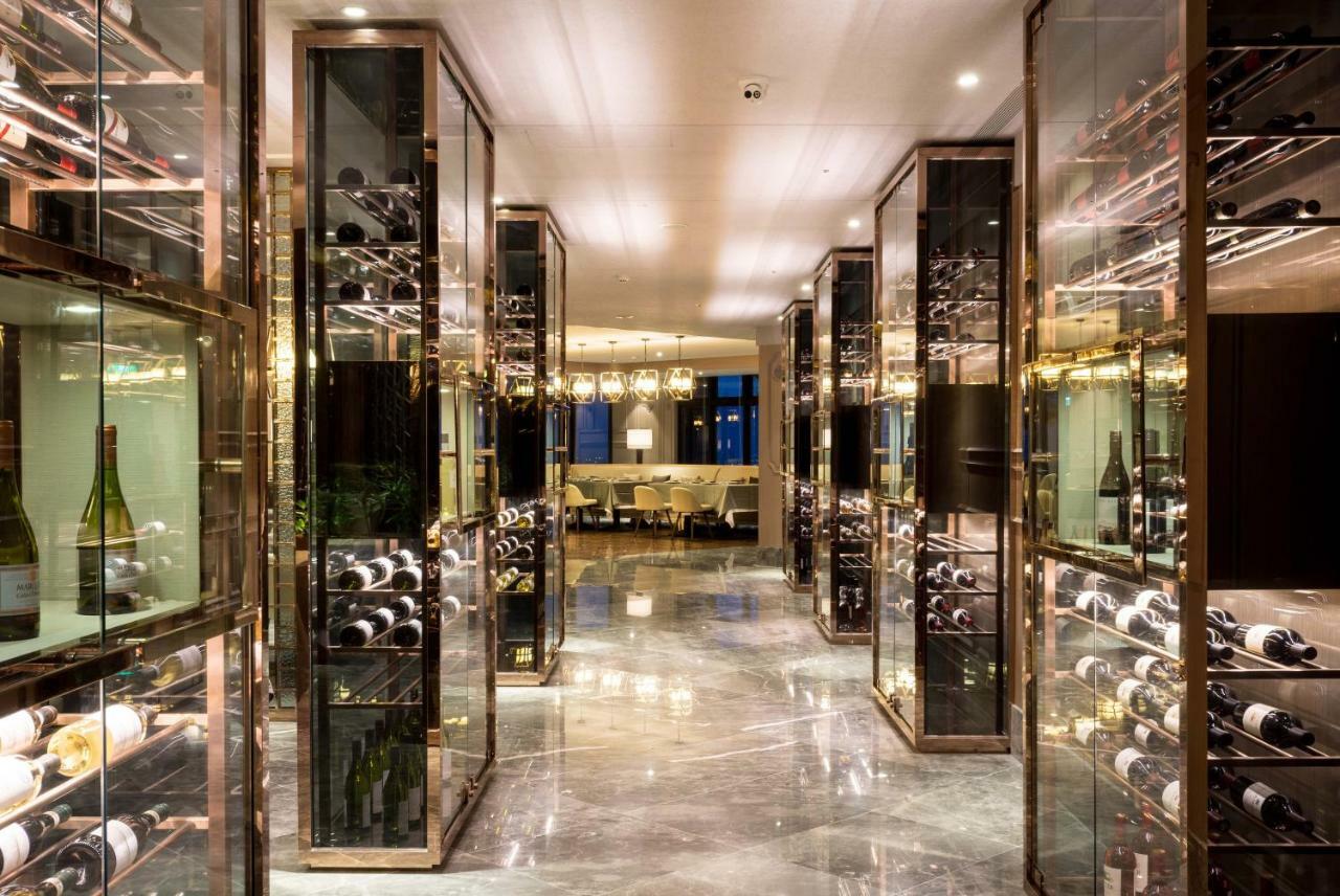 คังเยว่ ฮอต สปริง รีสอร์ต Hotel หลัวตง ภายนอก รูปภาพ Wine cellar